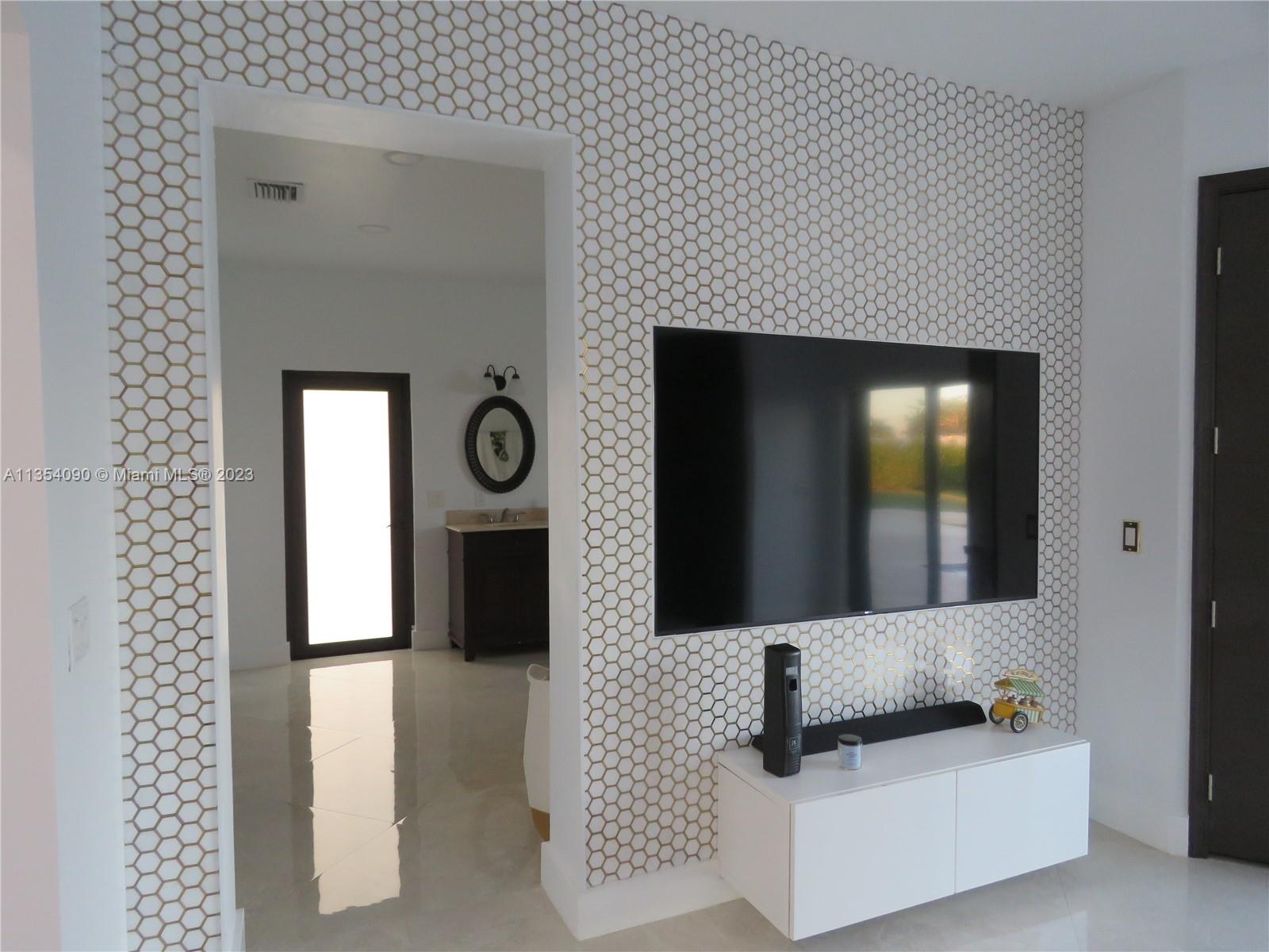 Redlands Homestead, FL 33031 - Photo 41 of 56 a bathroom with a sink a mirror and vanity