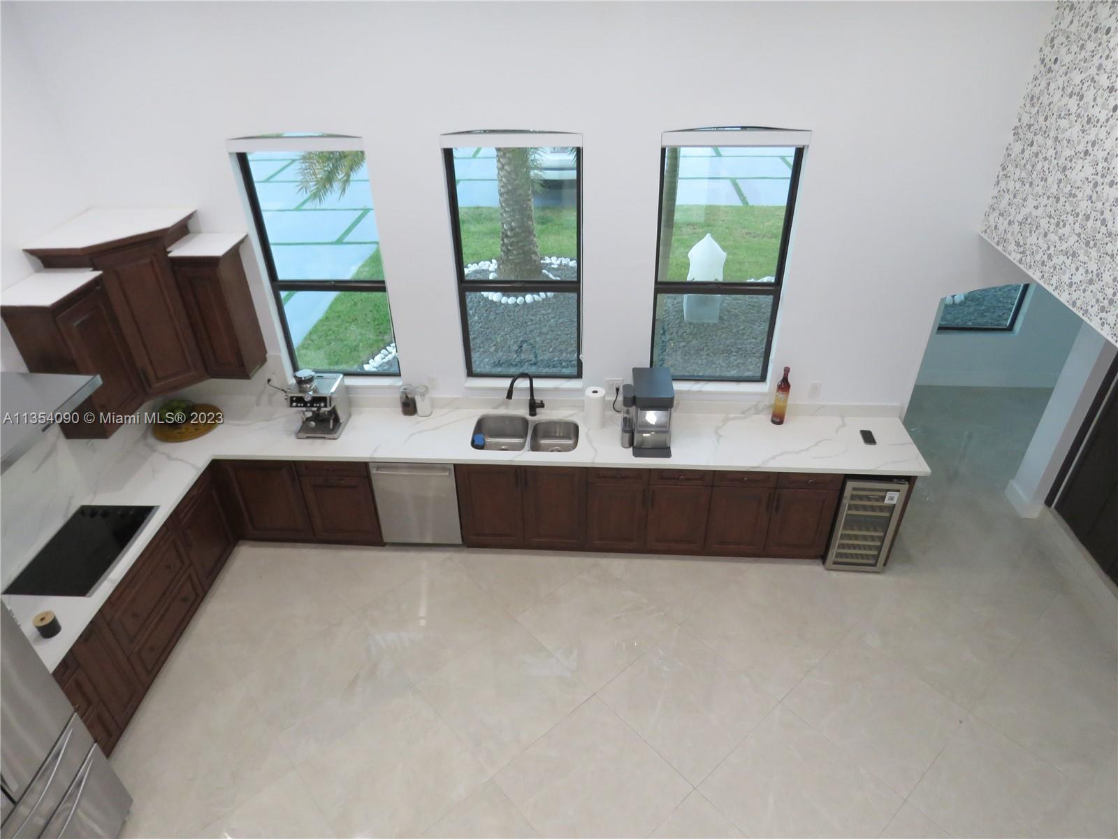 Redlands Homestead, FL 33031 - Photo 48 of 56 a bathroom with a double vanity sink and a mirror