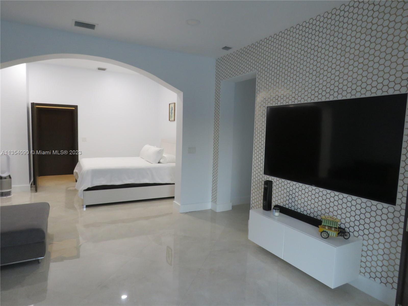 Redlands Homestead, FL 33031 - Photo 50 of 56 a view of living room with furniture and a flat screen tv