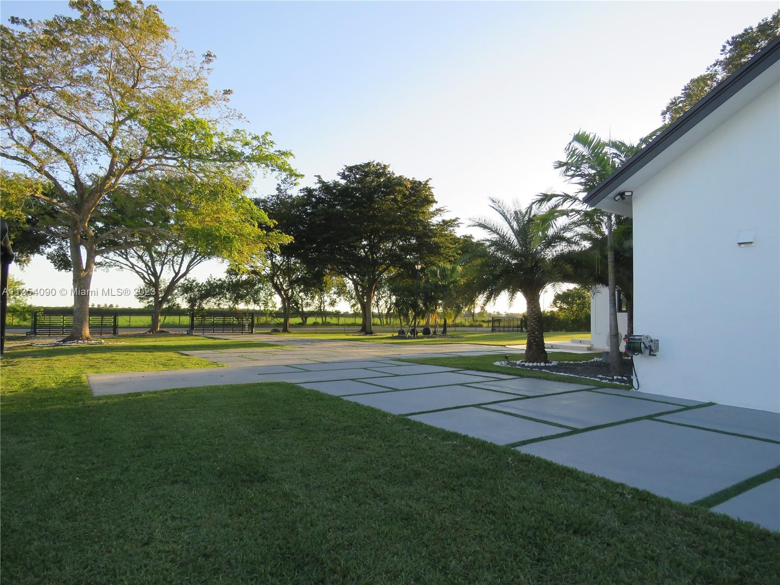 Redlands Homestead, FL 33031 - Photo 5 of 56 a view of swimming pool with trees and green space