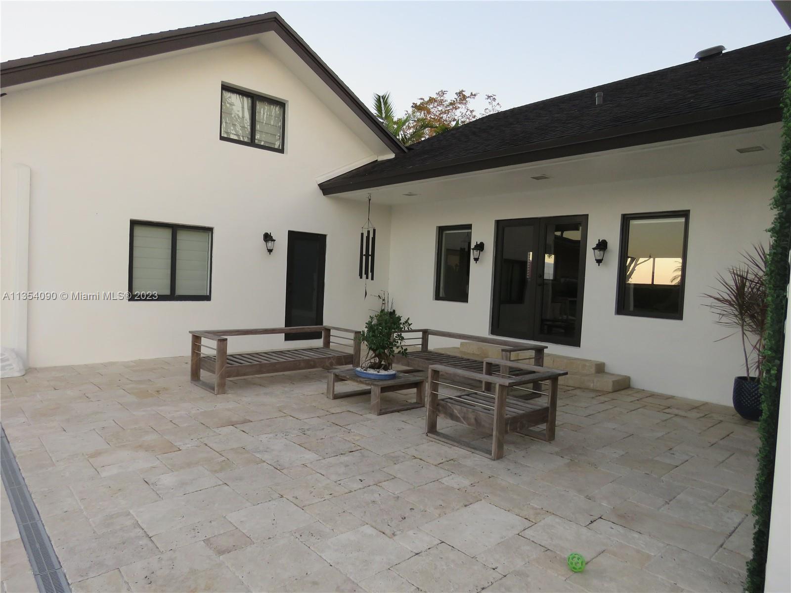 Redlands Homestead, FL 33031 - Photo 52 of 56 a view of a house with backyard and sitting area