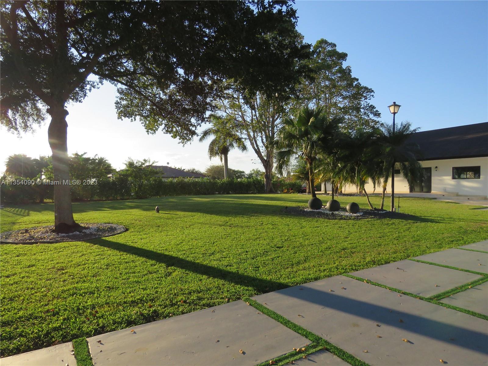 Redlands Homestead, FL 33031 - Photo 7 of 56 a view of a park with large trees