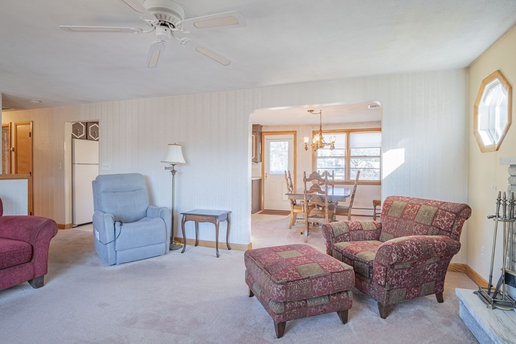 1 Christopher Drive Nahant, MA 01908 - Photo 11 of 41 a living room with furniture and a large window