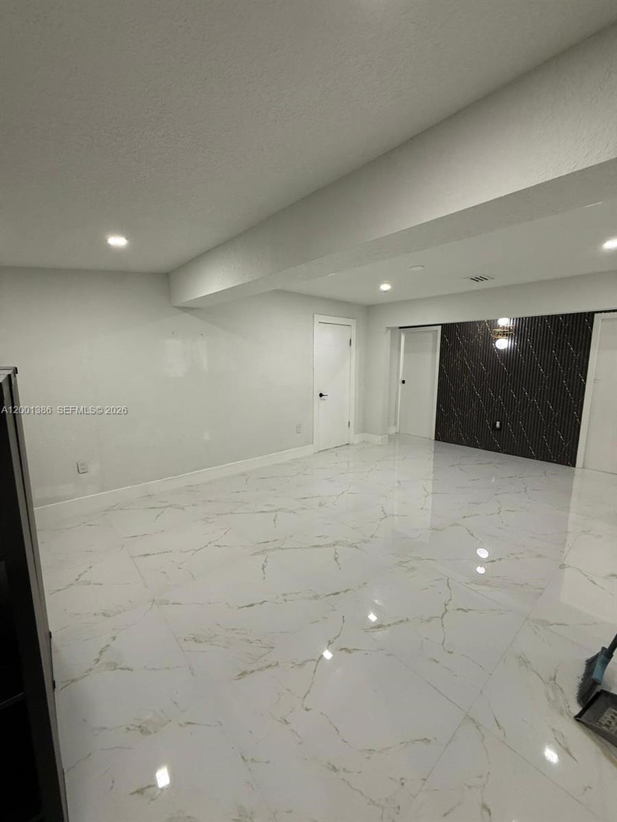 10460 Southwest 26th Terrace Miami, FL 33165 - Photo 14 of 28 a view of an empty room