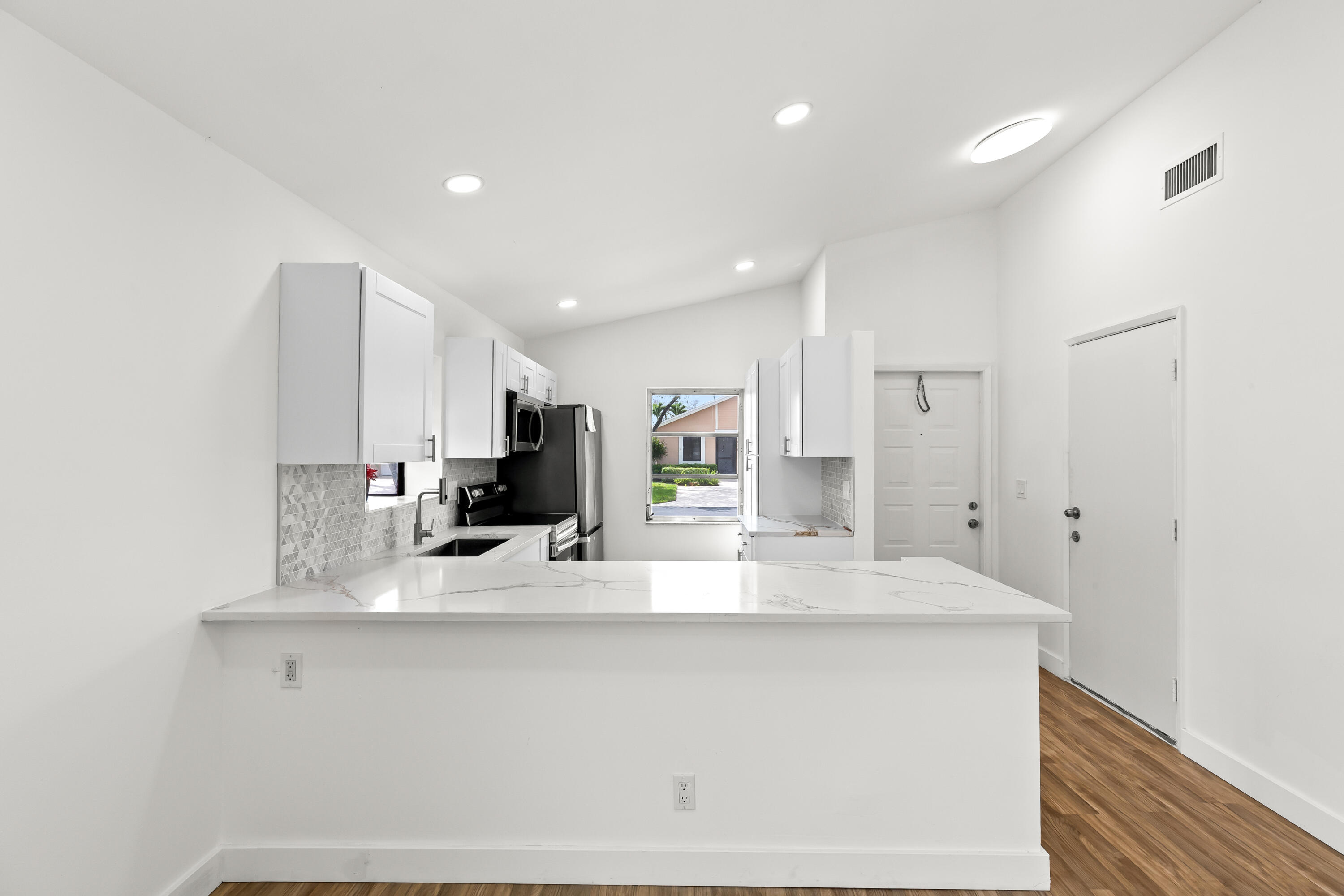 8089 Springtree Road Boca Raton, FL 33496 - Photo 2 of 35 Kitchen 1