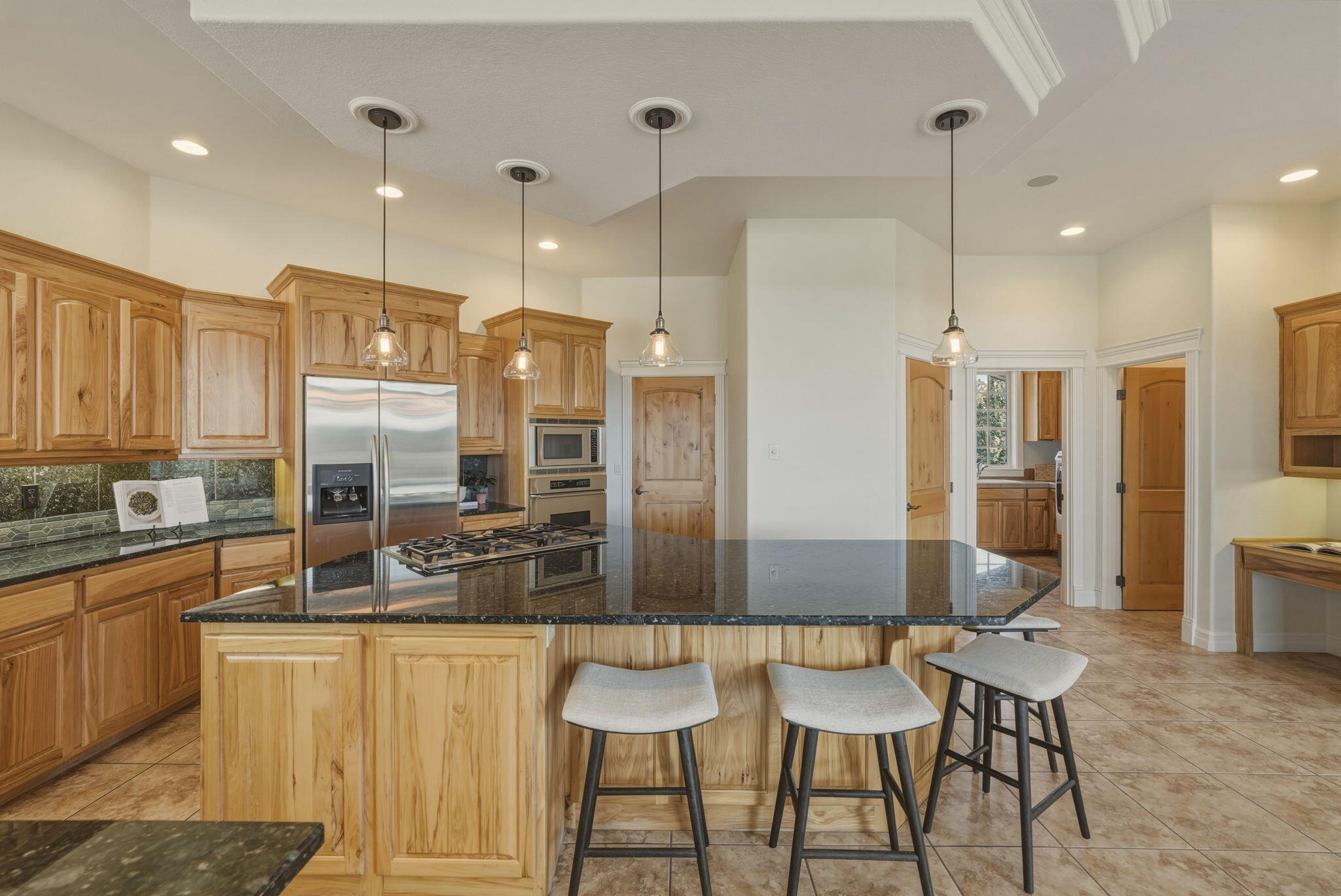 21450 Dale Road Bend, OR 97701 - Photo 23 of 75 Stainless steel appliances throughout, ample cabinetry and storage, walk-in pantry and convenient butler's pantry.