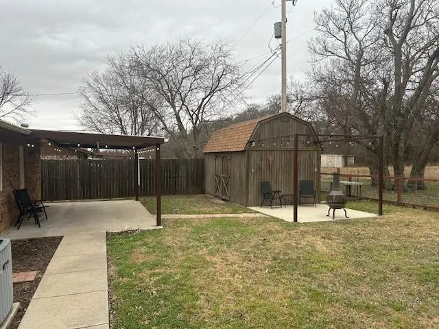 a house with trees in the background