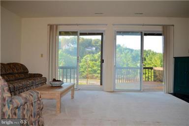 22 Ridge Court Basye, VA 22842 - Photo 25 of 30 Family Room has seamless access to the Deck