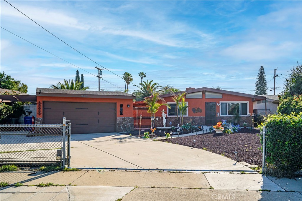 9417 Mango Avenue Fontana, CA 92335 - Photo 3 of 41 a front view of house with yard