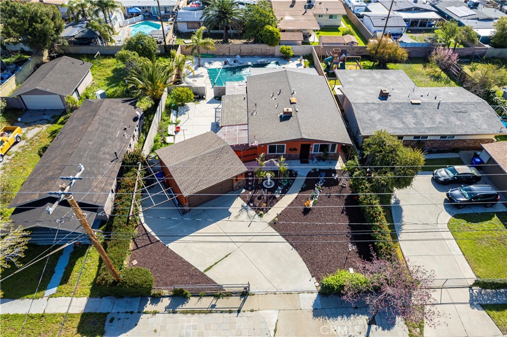 9417 Mango Avenue Fontana, CA 92335 - Photo 35 of 41 an aerial view of a house with yard swimming pool and outdoor seating