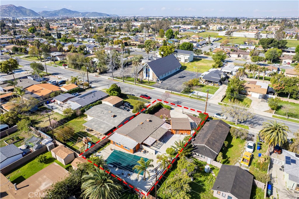 9417 Mango Avenue Fontana, CA 92335 - Photo 40 of 41 an aerial view of residential houses with outdoor space