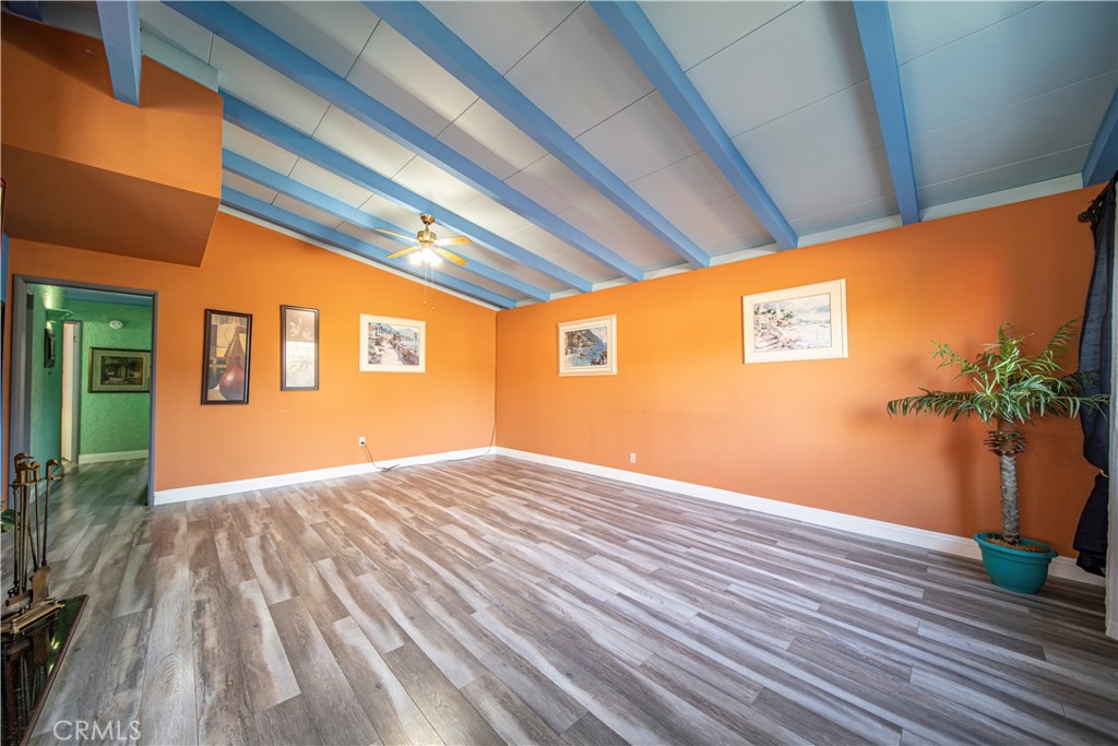 9417 Mango Avenue Fontana, CA 92335 - Photo 6 of 41 a view of backyard with wooden floor and a potted plant