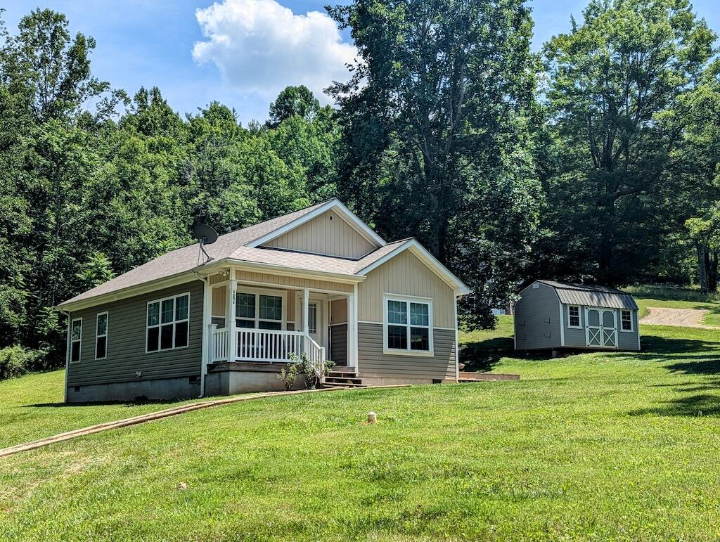 1251 Epperly Mill Road Southwest Floyd, VA 24091 - Photo 4 of 20 a front view of a house with yard and green space