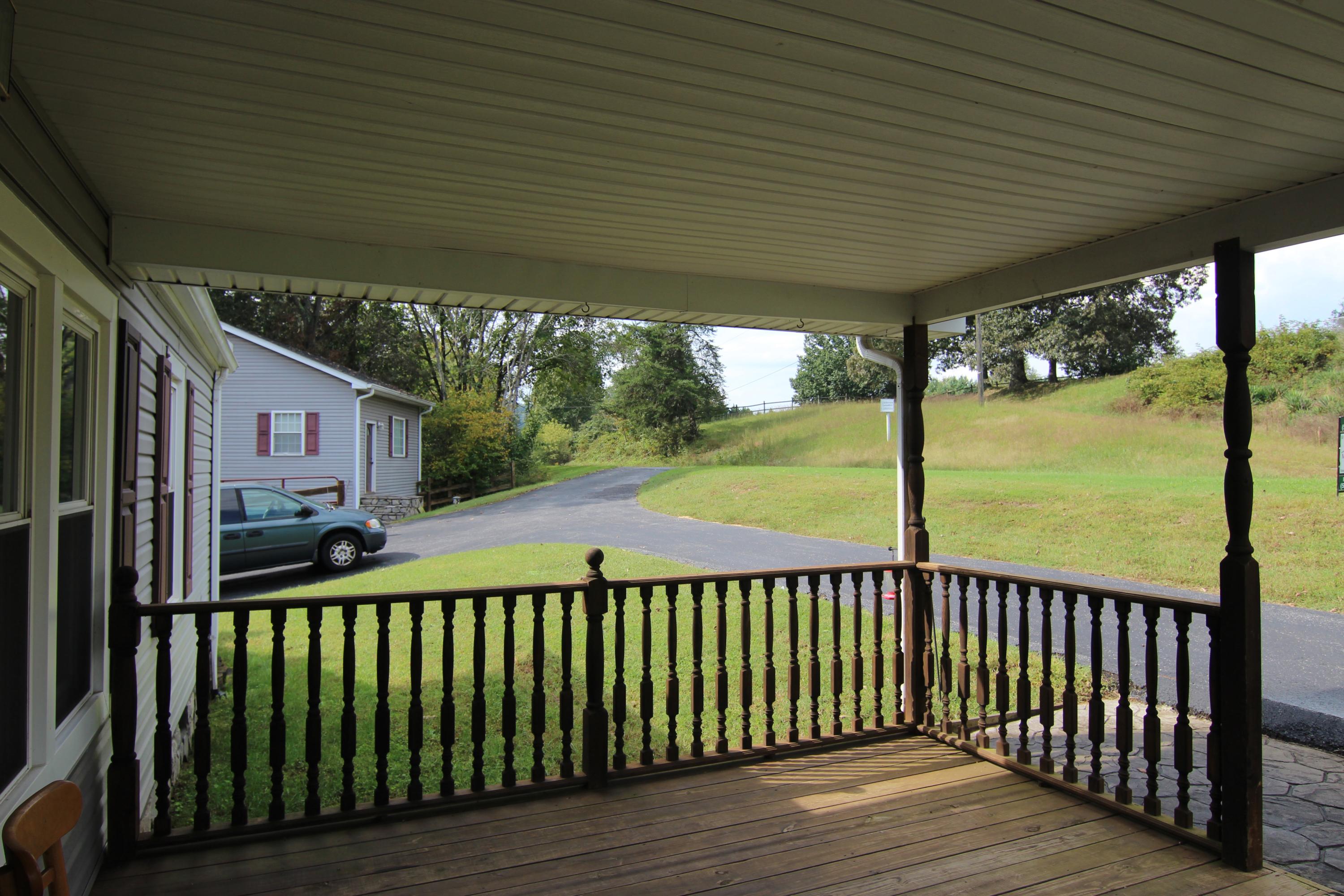 6773 Goodview Road Goodview, VA 24095 - Photo 3 of 43 a view of a street from deck