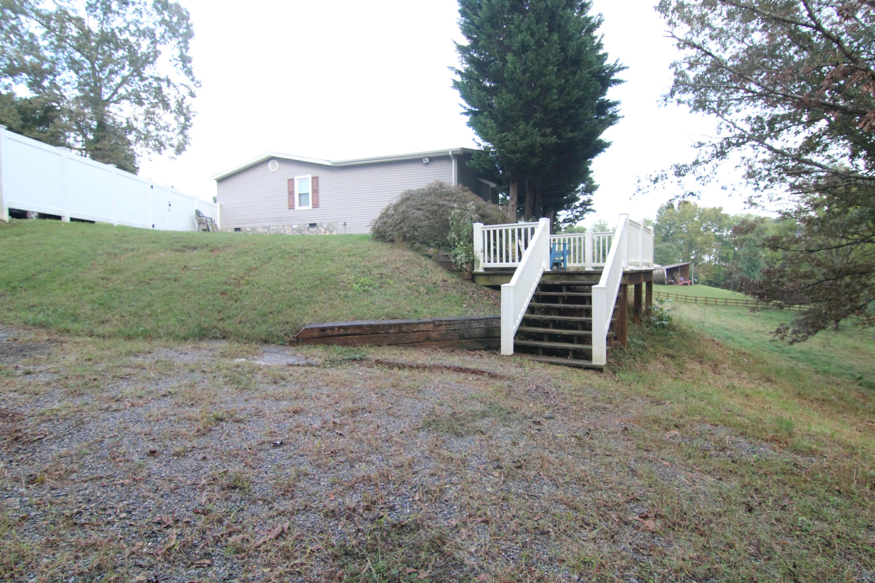 6773 Goodview Road Goodview, VA 24095 - Photo 41 of 43 a view of a house with a yard