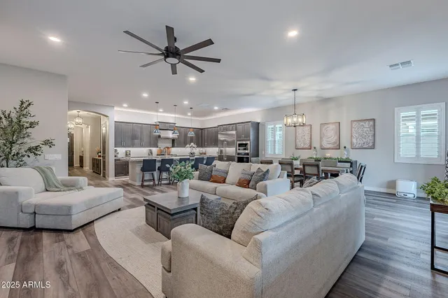 a bathroom with a double vanity sink mirror and shower