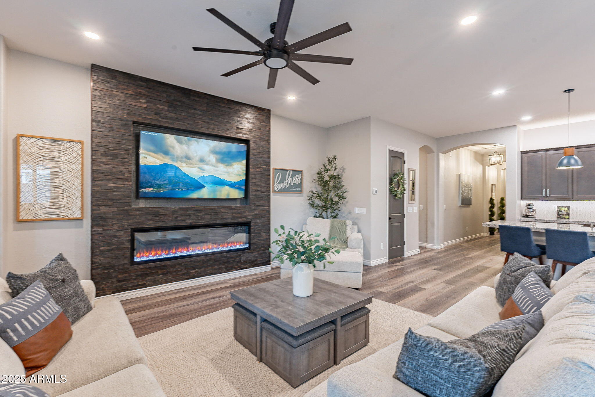 22900 East Reins Road Queen Creek, AZ 85142 - Photo 20 of 74 a living room with furniture and a flat screen tv