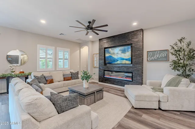 a living room with furniture and a window