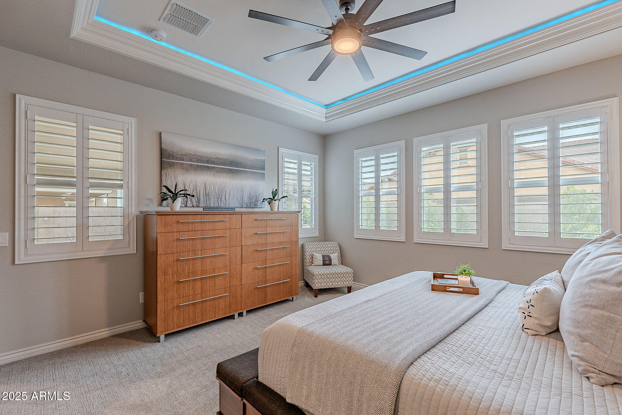 22900 East Reins Road Queen Creek, AZ 85142 - Photo 25 of 74 a bedroom with a bed and a dresser