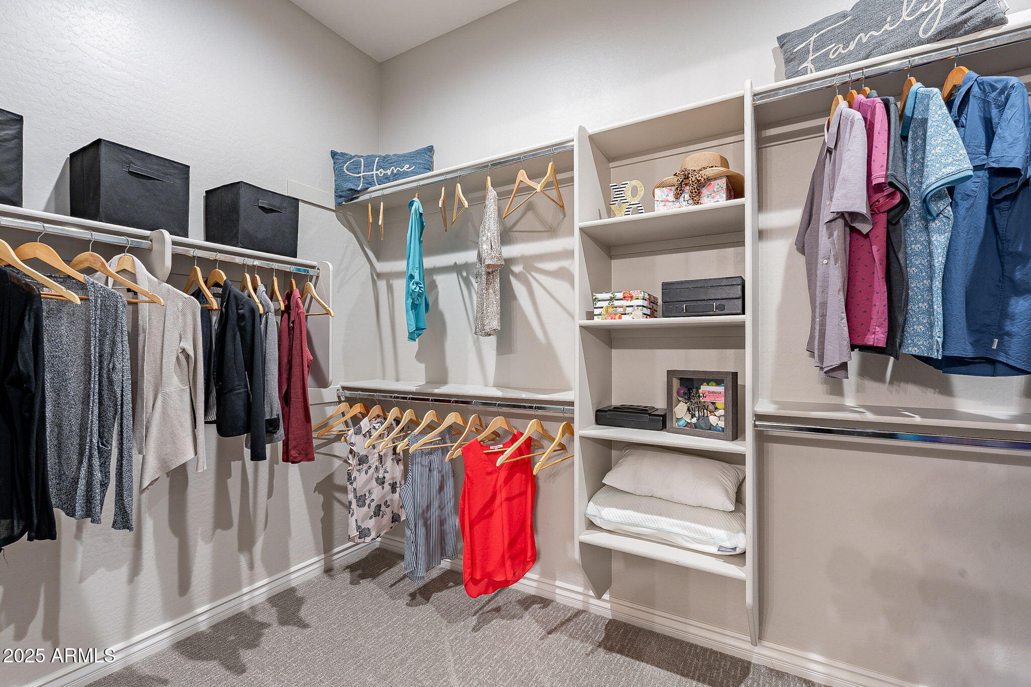22900 East Reins Road Queen Creek, AZ 85142 - Photo 28 of 74 a view of walk in closet with clothes