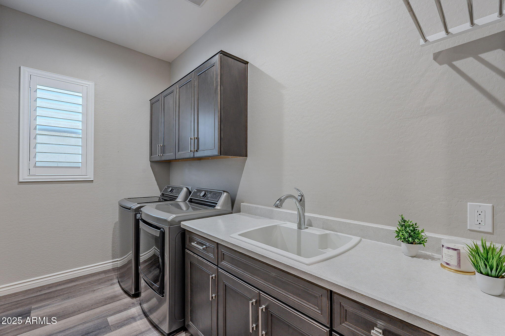 22900 East Reins Road Queen Creek, AZ 85142 - Photo 32 of 74 a view of a sink and cabinets