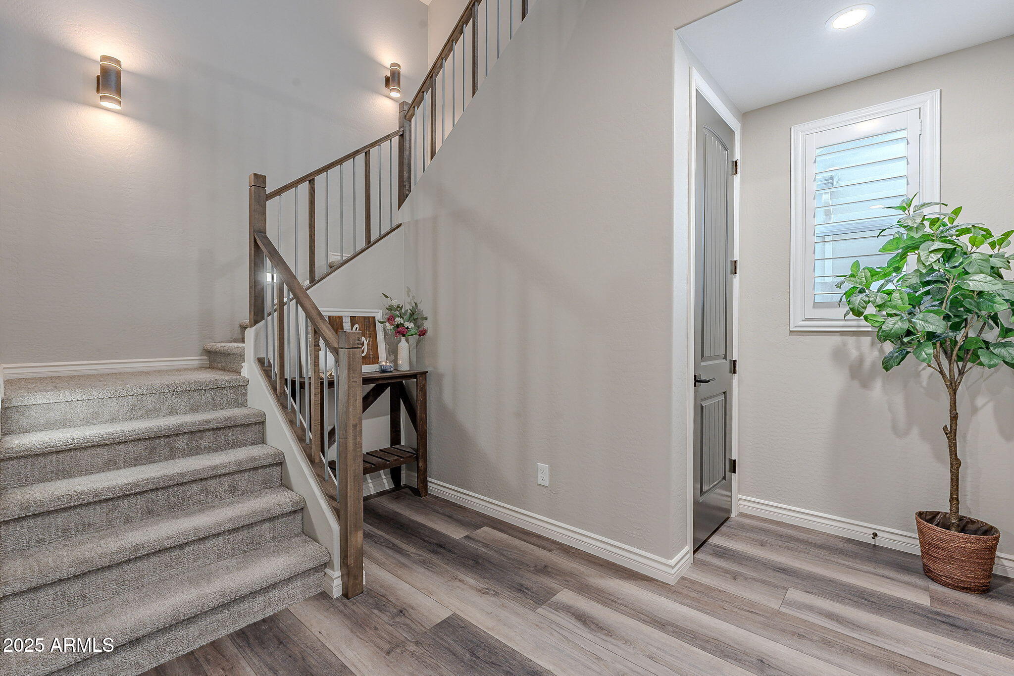 22900 East Reins Road Queen Creek, AZ 85142 - Photo 37 of 74 a view of entryway with wooden floor and a potted plant