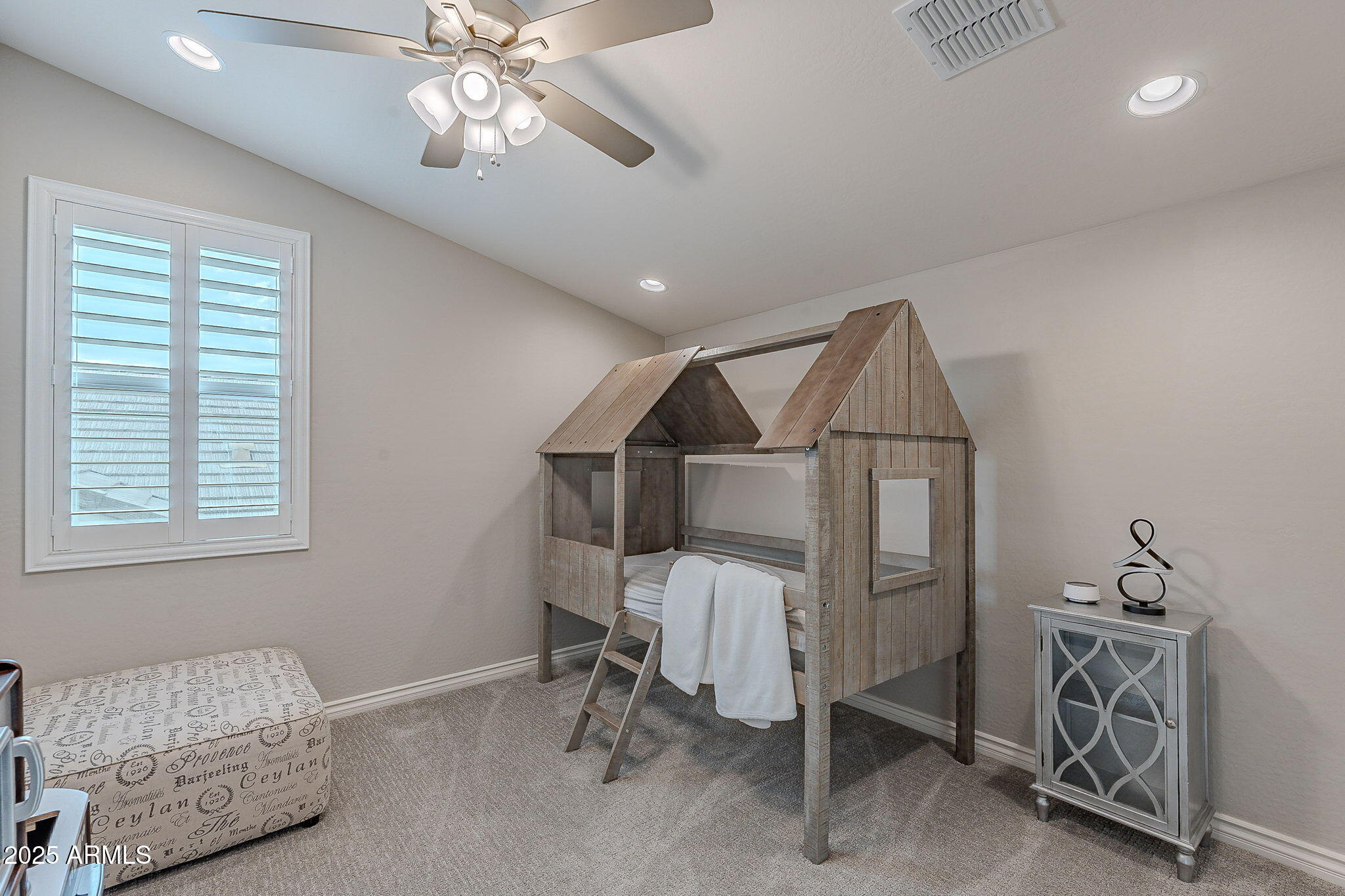 22900 East Reins Road Queen Creek, AZ 85142 - Photo 41 of 74 a bedroom with furniture and a window