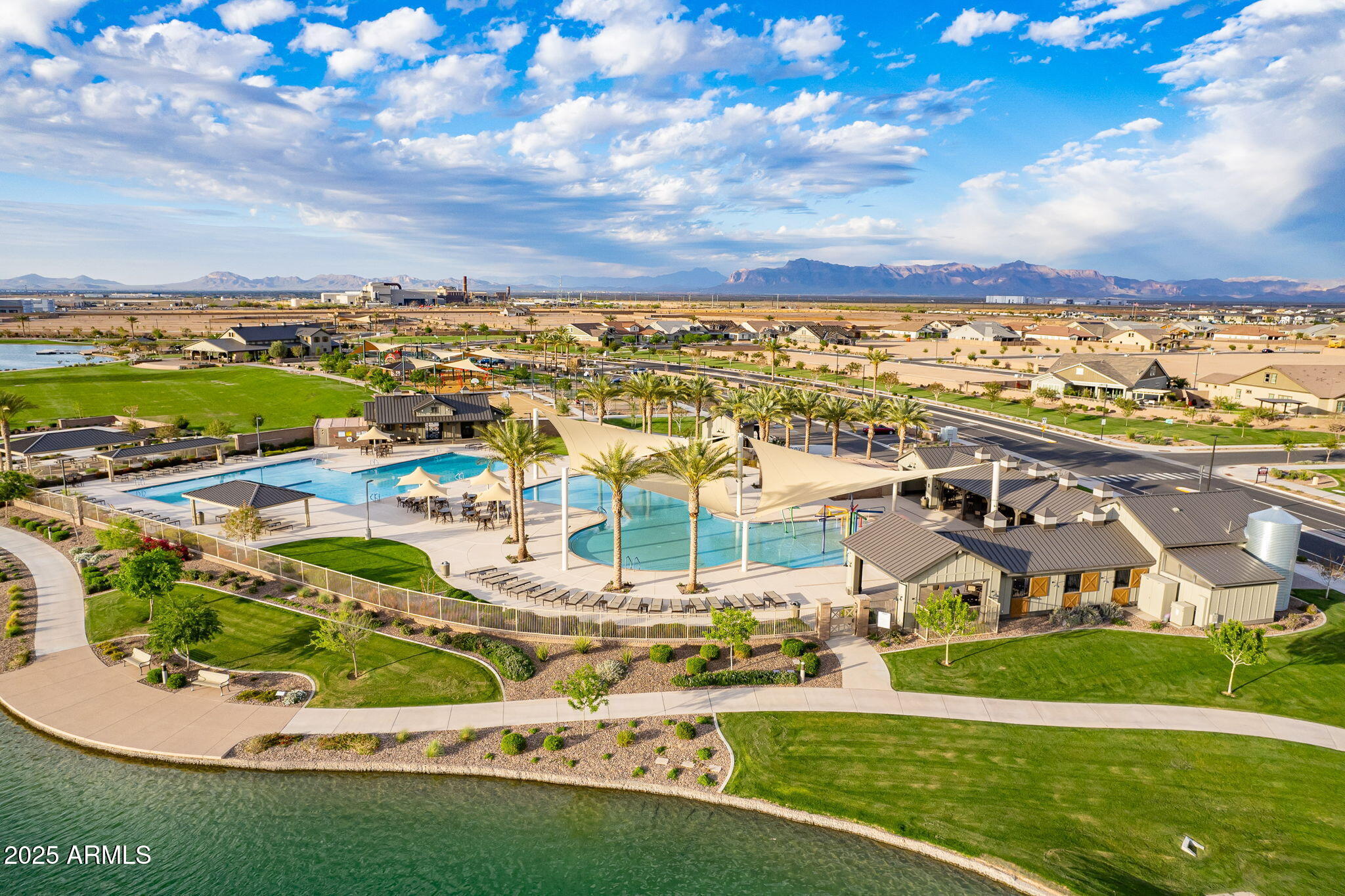 22900 East Reins Road Queen Creek, AZ 85142 - Photo 67 of 74 an aerial view of residential houses with outdoor space