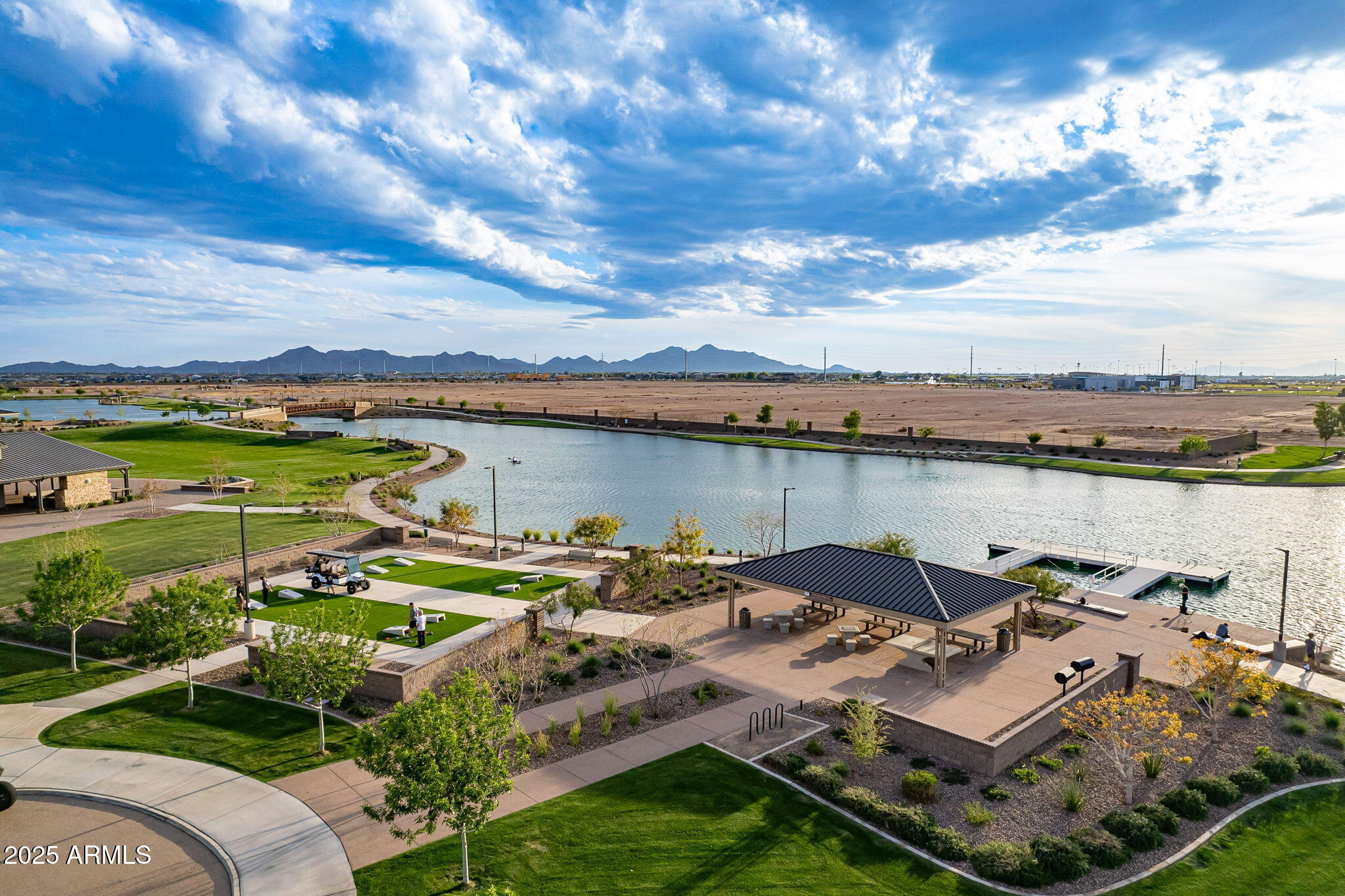 22900 East Reins Road Queen Creek, AZ 85142 - Photo 69 of 74 a view of a lake with a patio