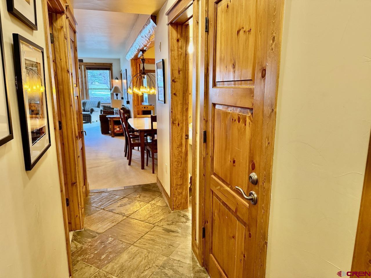 9 Hunter Hill Road, Unit 104 Crested Butte, CO 81225 - Photo 24 of 38 a view of a porch with a door