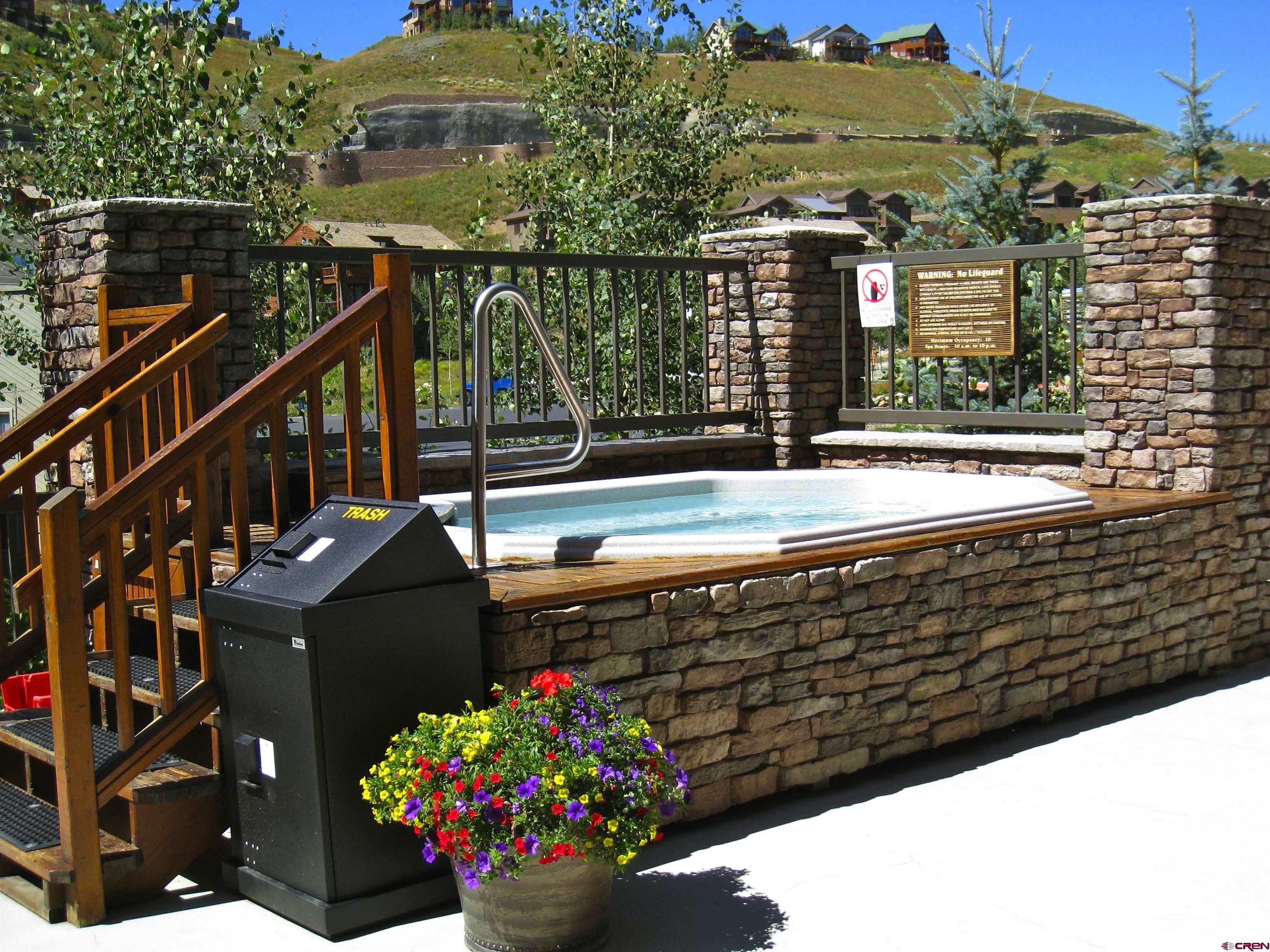 9 Hunter Hill Road, Unit 104 Crested Butte, CO 81225 - Photo 32 of 38 a view of a porch