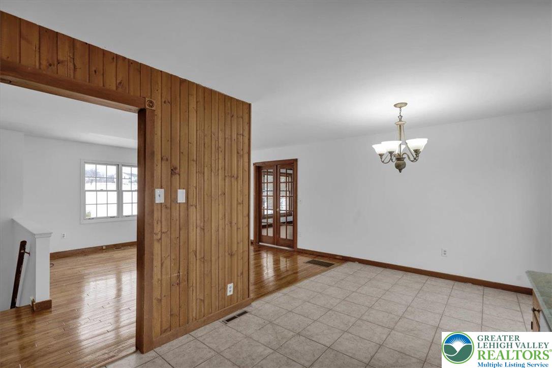 282 Ernst Road Mohrsville, PA 19541 - Photo 14 of 50 wooden floor in an empty room with a window