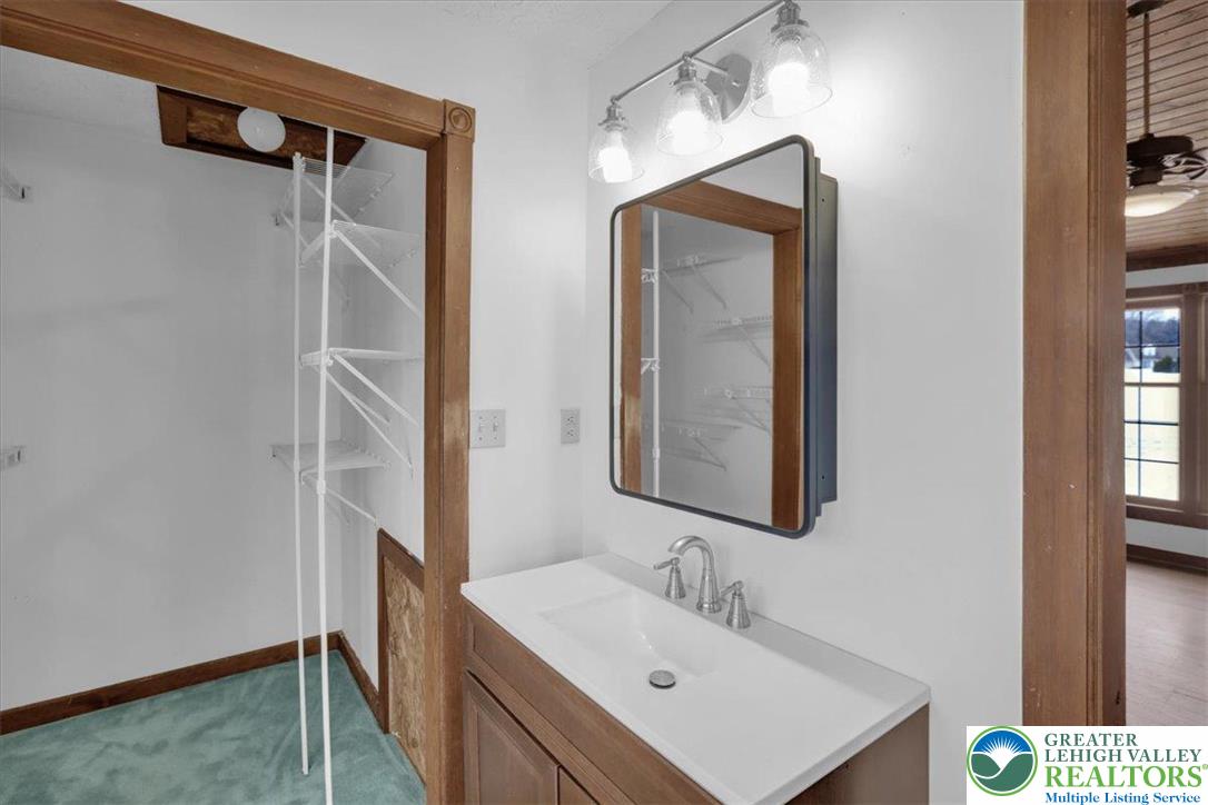 282 Ernst Road Mohrsville, PA 19541 - Photo 20 of 50 a bathroom with a sink vanity and mirror