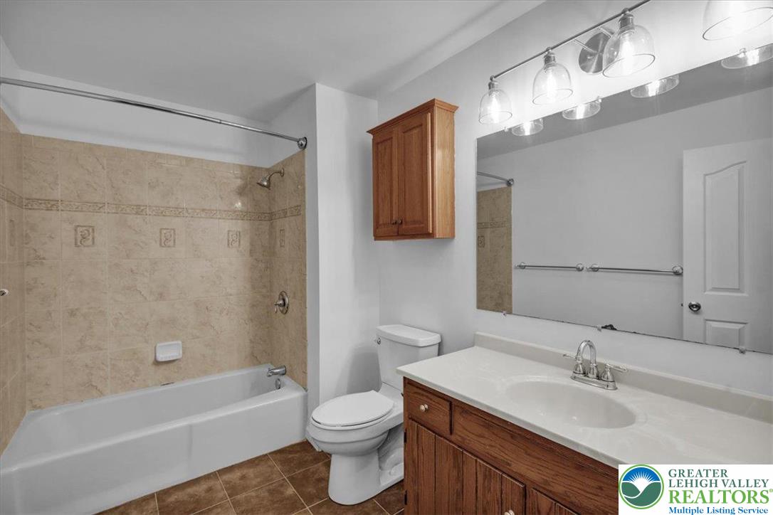 282 Ernst Road Mohrsville, PA 19541 - Photo 21 of 50 a bathroom with a sink vanity granite toilet tub and shower