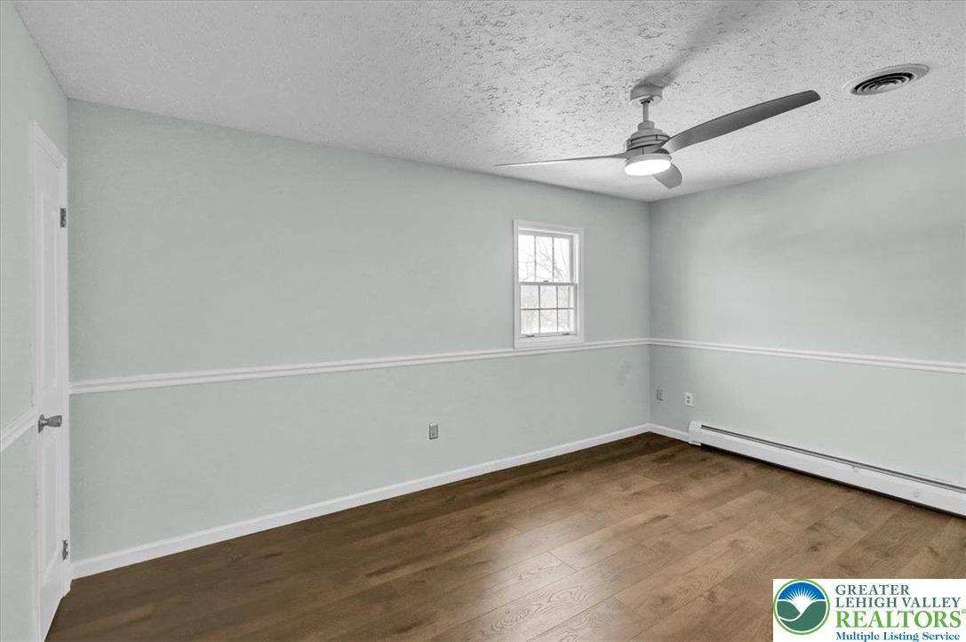 282 Ernst Road Mohrsville, PA 19541 - Photo 23 of 50 an empty room with a window and ceiling fan