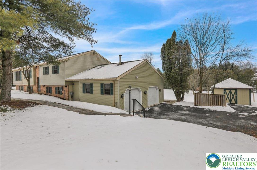 282 Ernst Road Mohrsville, PA 19541 - Photo 3 of 50 a front view of a house with a yard