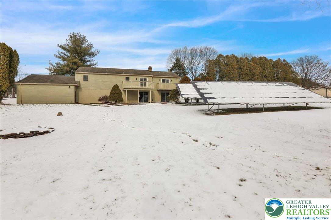 282 Ernst Road Mohrsville, PA 19541 - Photo 48 of 50 a view of a white house with a yard