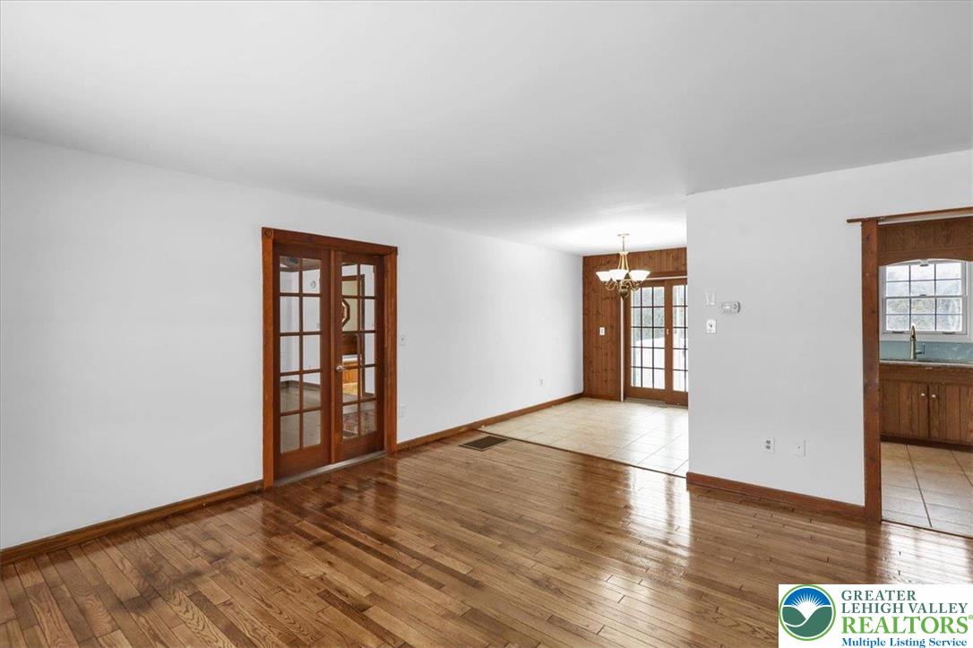 282 Ernst Road Mohrsville, PA 19541 - Photo 8 of 50 wooden floor in an empty room with a window