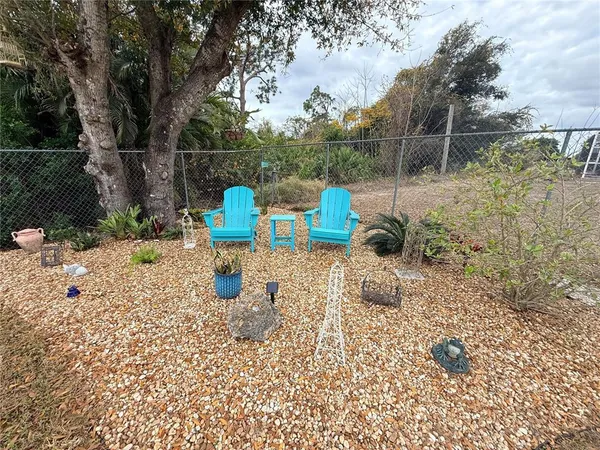 a view of a bench in the garden