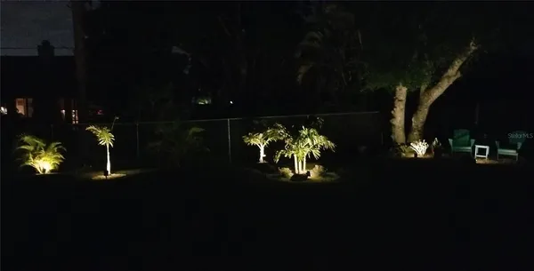 a view of a backyard of the house