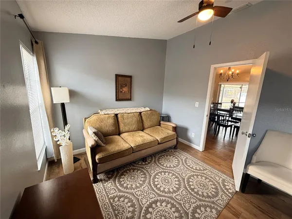 a view of a workspace with furniture