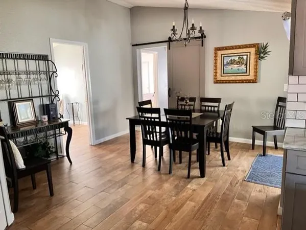 a view of a dining room with furniture