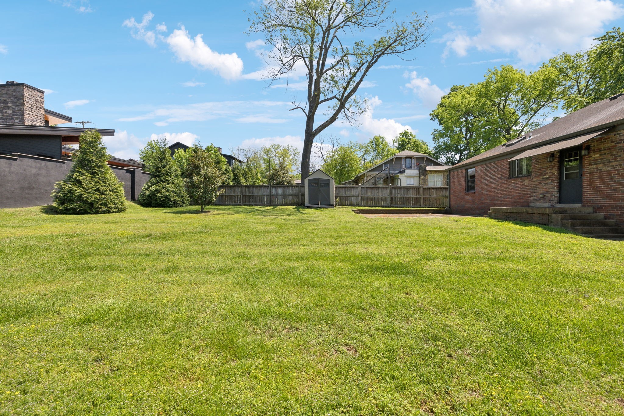 4202 Murphy Road Nashville, TN 37209 - Photo 32 of 34 a view of a back yard of the house