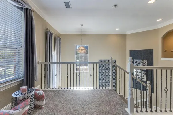 a view of hallway with livingroom