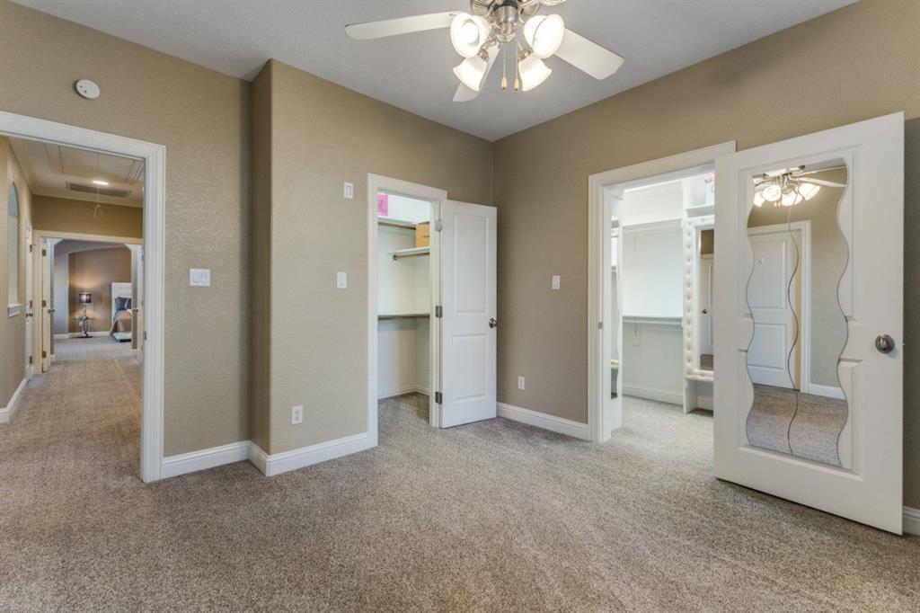 4931 Homer Street Dallas, TX 75206 - Photo 20 of 29 an empty room with fan and entrance