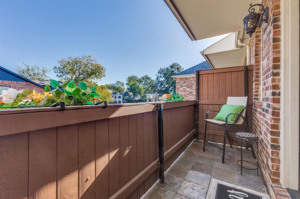 4931 Homer Street Dallas, TX 75206 - Photo 26 of 30 a view of a chair and table in the balcony