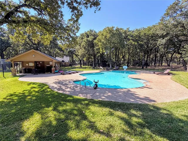 a view of an empty room with a fireplace