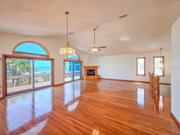 a kitchen with stainless steel appliances a stove a sink and a microwave