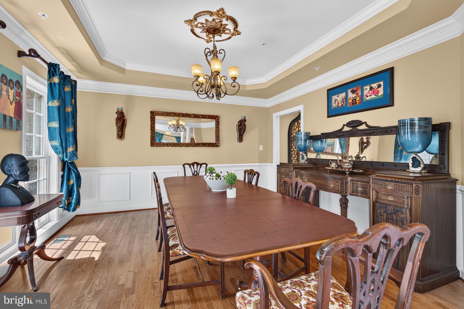 9451 Brink Road Gaithersburg, MD 20882 - Photo 8 of 57 Dining room-tray ceiling, wainscotting, chair rail