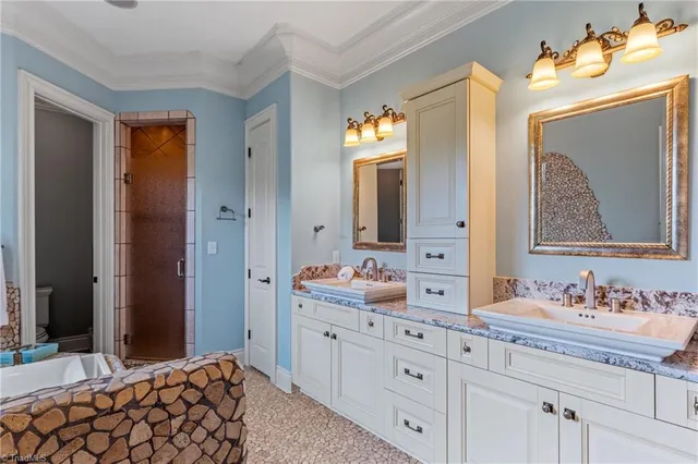 $975,000 | 5603 Monk Court, Summerfield, NC 27358